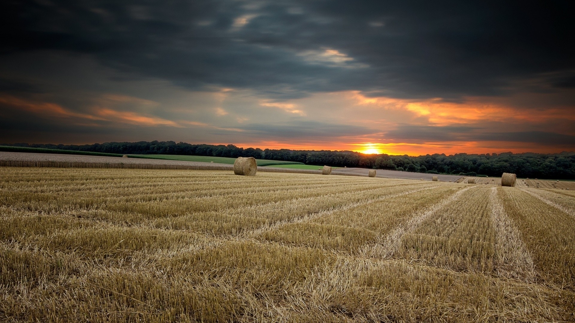 ws_Fields_Haystack_Trees_&_Sunset_1920x1080